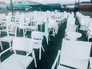 185 Empty White Chairs