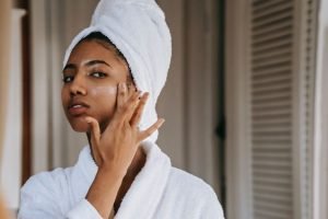 Woman Applying Skin Cream